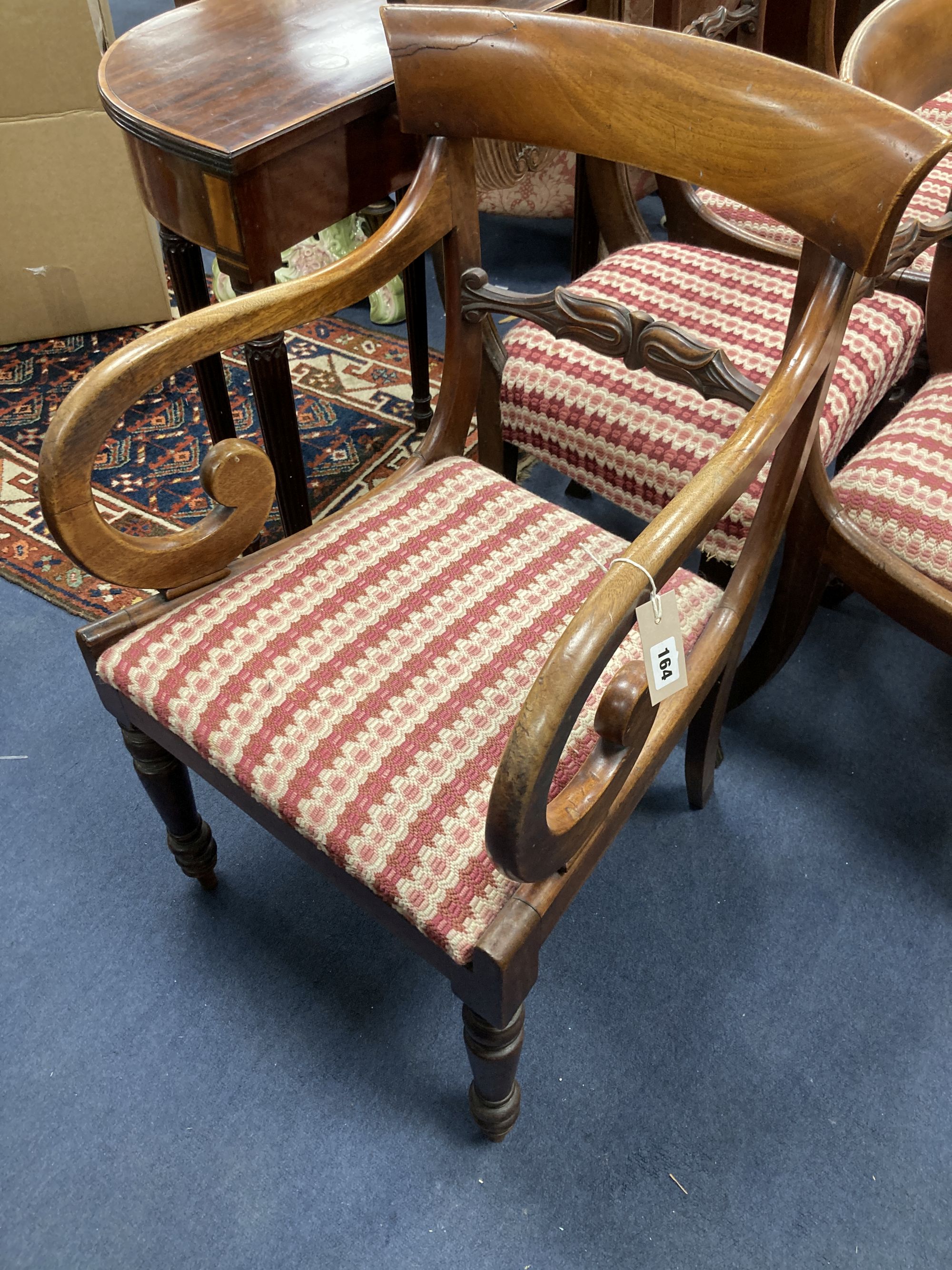 A harlequin set of nine George IV mahogany dining chairs (one having arms)
